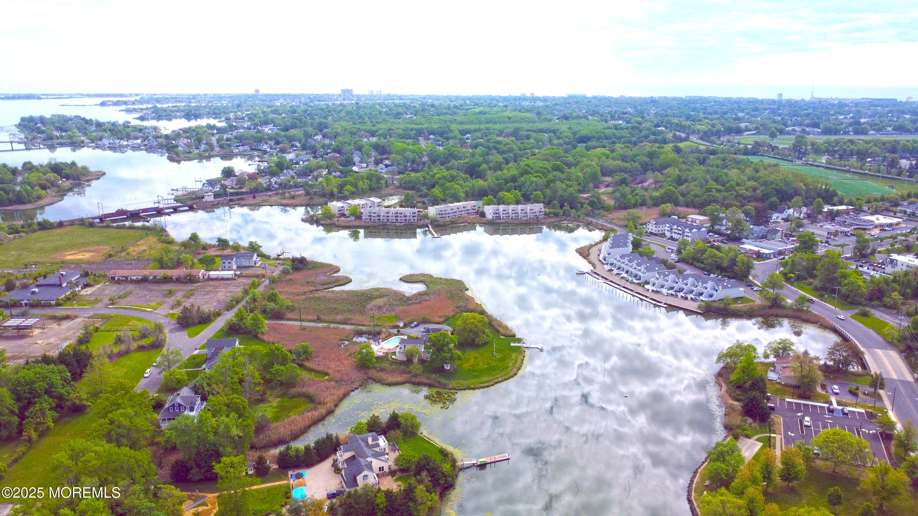 40 Riverside Avenue Oceanport, NJ 07757 - Photo 9 of 62 an aerial view of residential houses with outdoor space