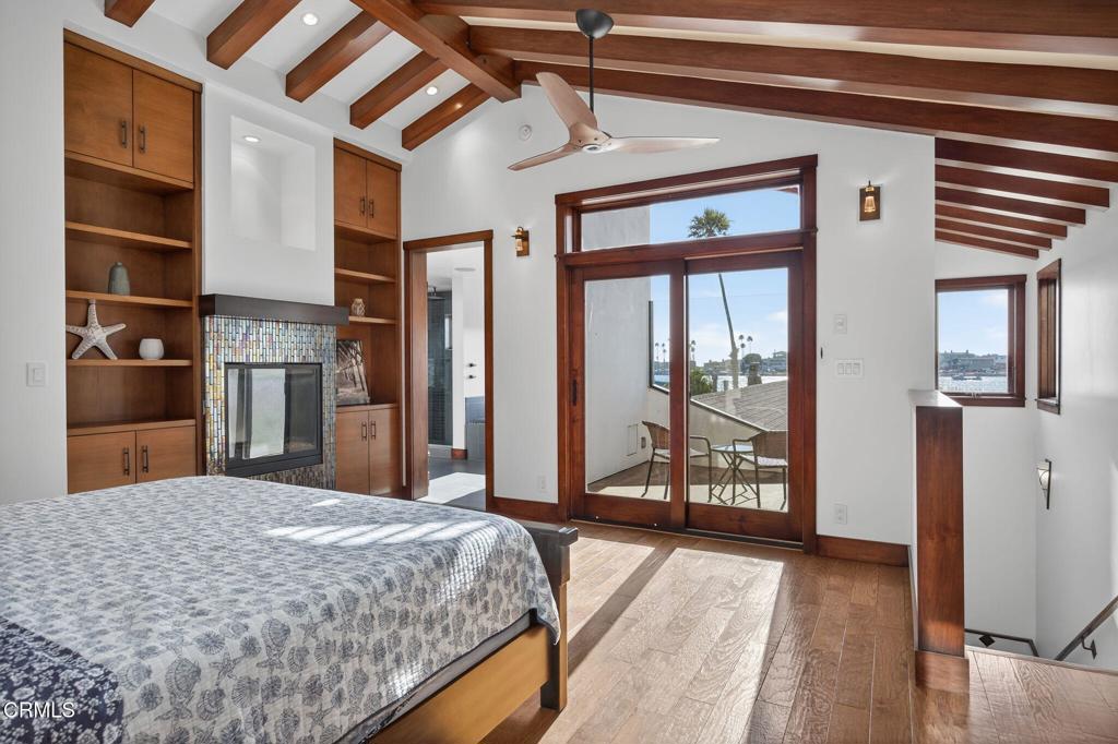 2916 Lakeshore Court Oxnard, CA 93035 - Photo 16 of 51 a bedroom with a bed closet and a large window