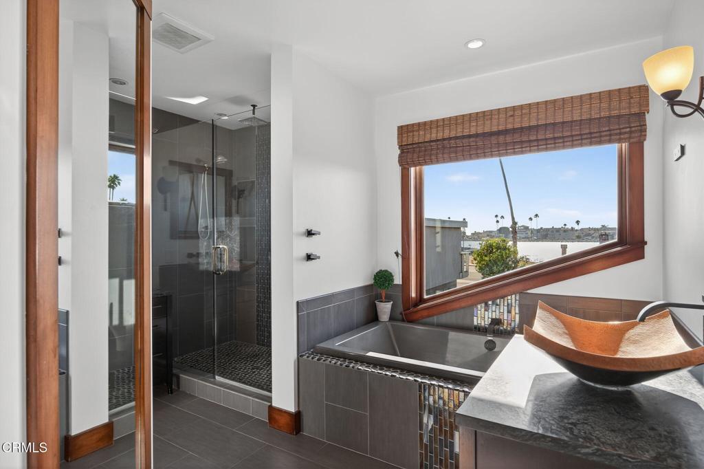 2916 Lakeshore Court Oxnard, CA 93035 - Photo 20 of 51 a room with stainless steel appliances kitchen island granite countertop a refrigerator and a sink