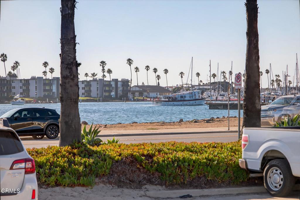 2916 Lakeshore Court Oxnard, CA 93035 - Photo 29 of 51 a view of a street with a cars park next to a road
