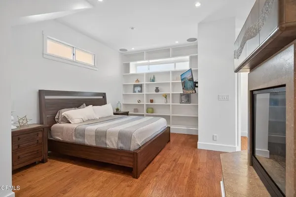 a bedroom with a bed and closet