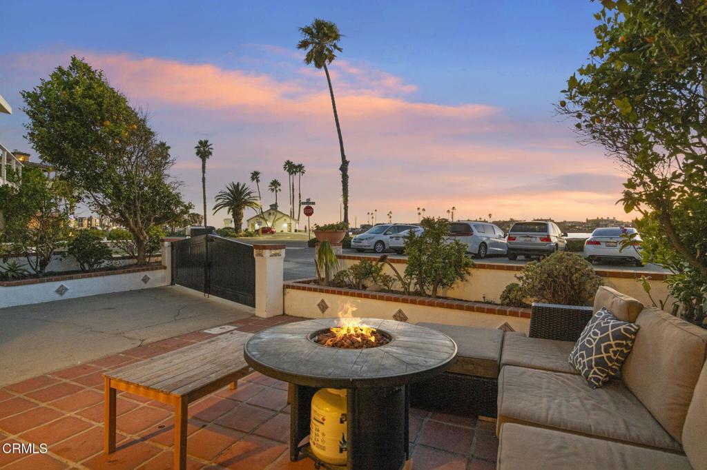 2916 Lakeshore Court Oxnard, CA 93035 - Photo 3 of 51 a view of a balcony with a table and chairs