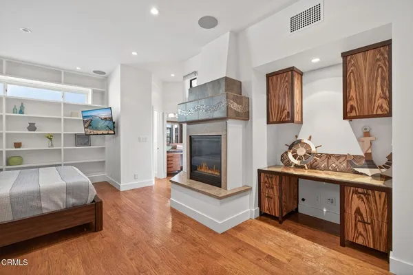 a view of livingroom with furniture and fireplace