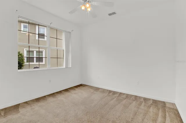 a view of backyard with hallway