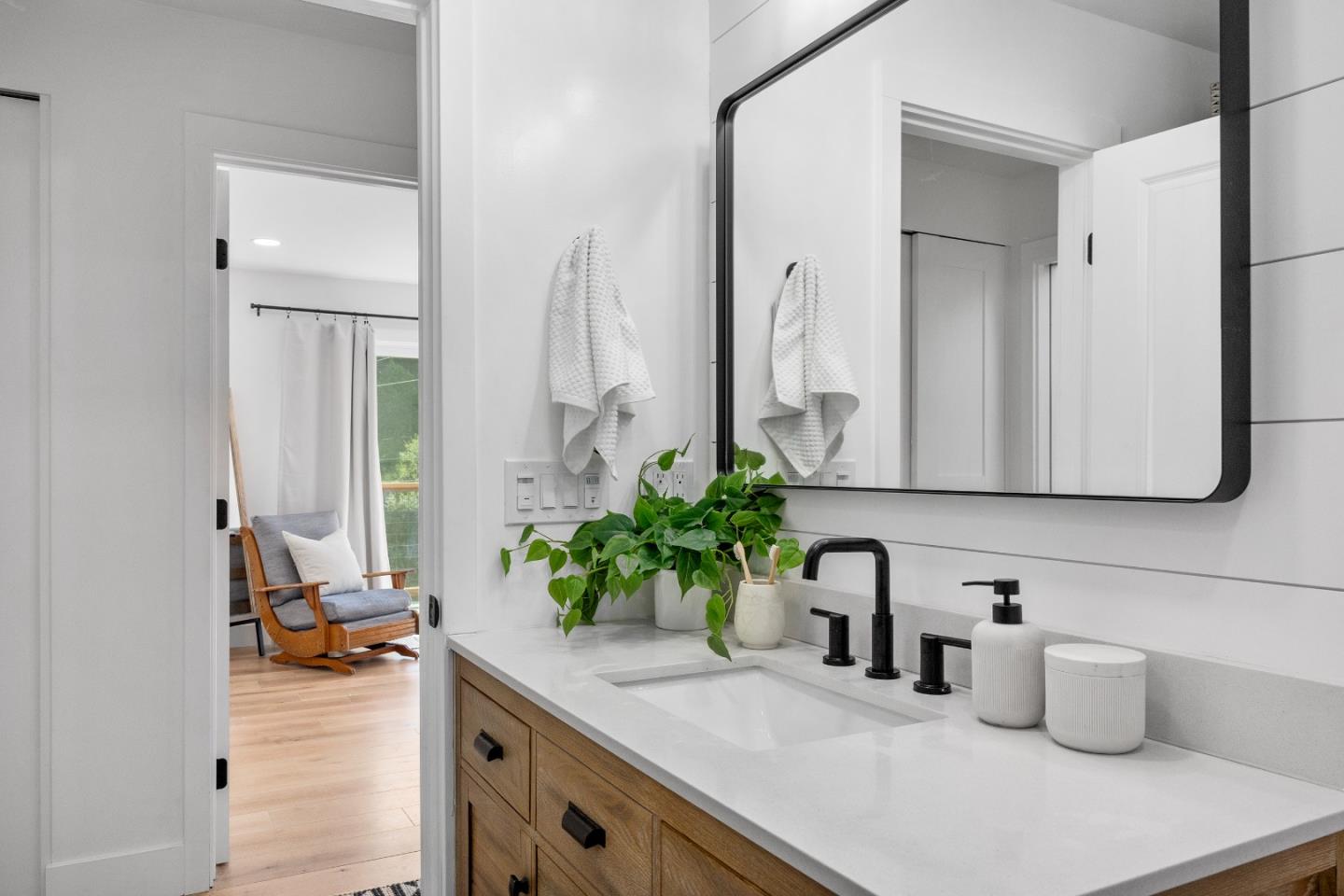 305 Sumner Avenue Aptos, CA 95003 - Photo 17 of 22 a kitchen with a potted plant on the counter and cabinets