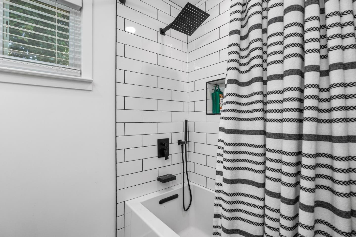 305 Sumner Avenue Aptos, CA 95003 - Photo 18 of 22 a bathroom with a sink and a shower