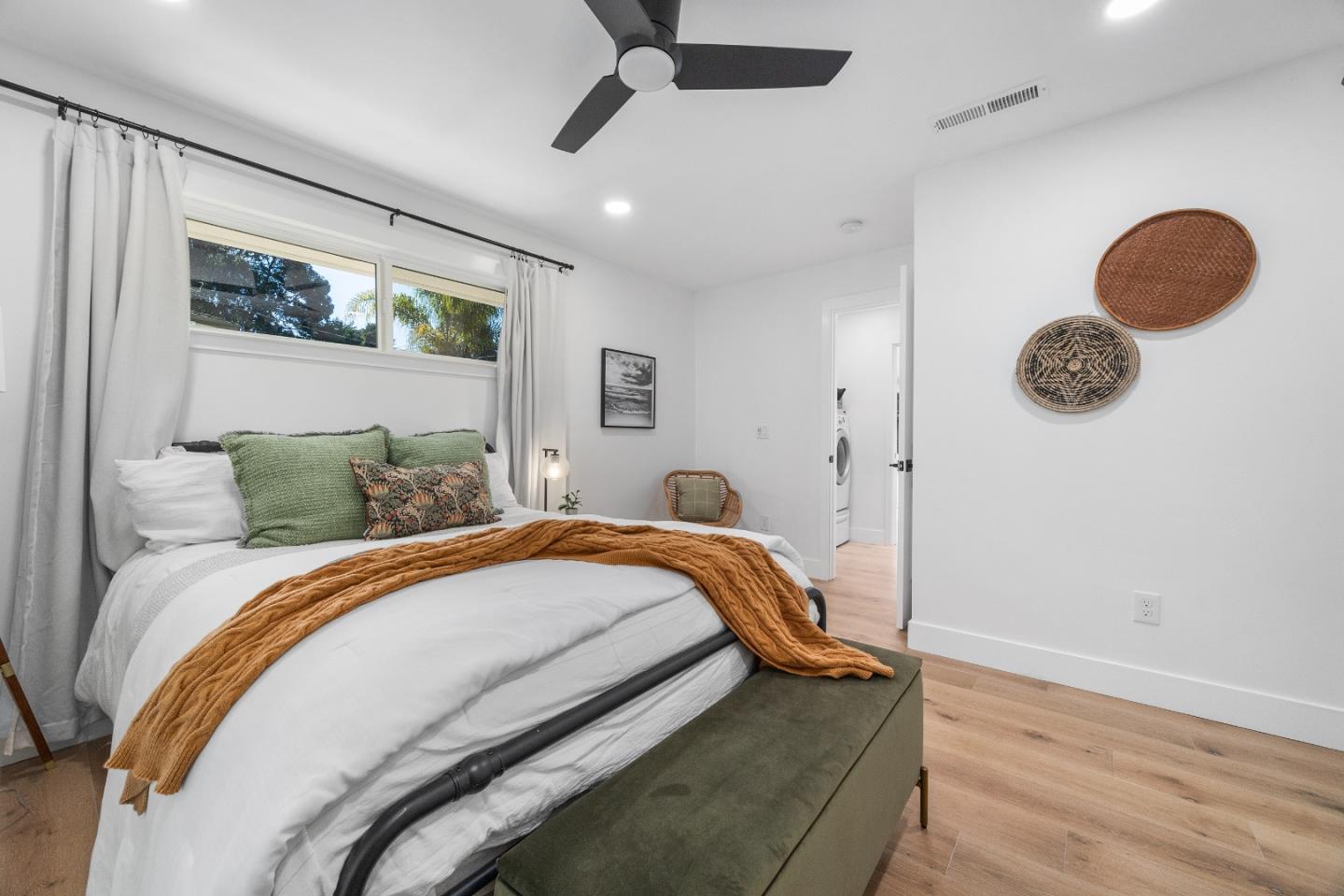 305 Sumner Avenue Aptos, CA 95003 - Photo 19 of 22 a bedroom with a bed and painting on the wall