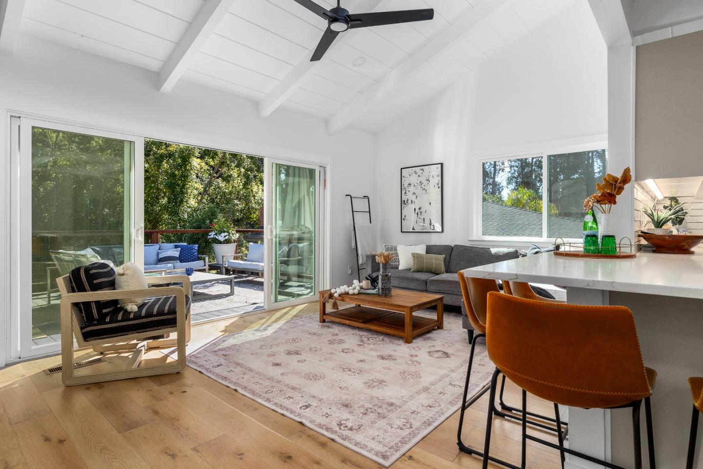 305 Sumner Avenue Aptos, CA 95003 - Photo 7 of 22 a living room with patio furniture and a floor to ceiling window