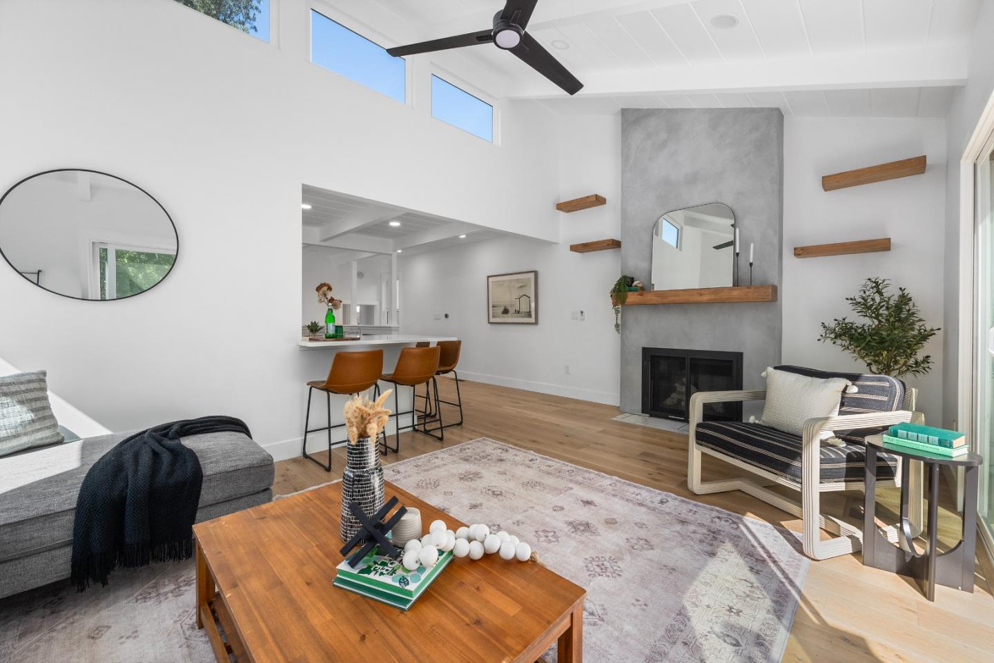 305 Sumner Avenue Aptos, CA 95003 - Photo 8 of 22 a living room with furniture and a fireplace