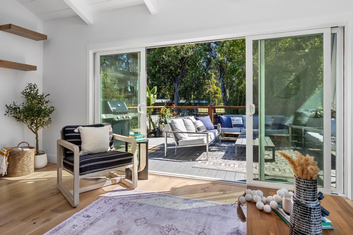 305 Sumner Avenue Aptos, CA 95003 - Photo 10 of 22 a living room with furniture and a floor to ceiling window