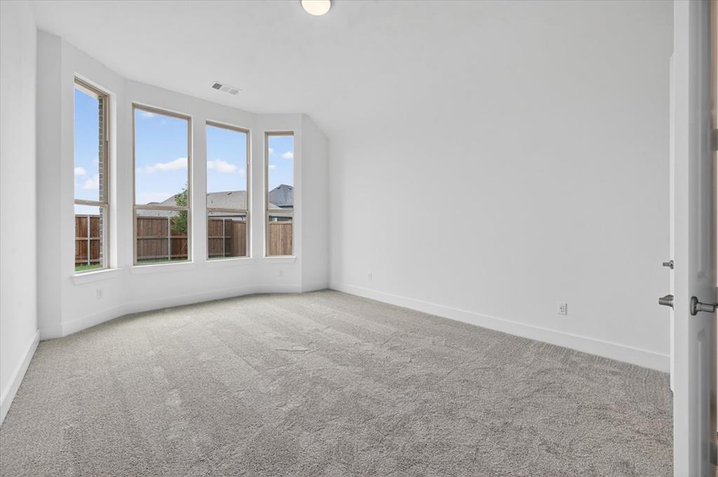1629 Buscot Lane Fort Worth, TX 76052 - Photo 12 of 26 a view of an empty room with a window