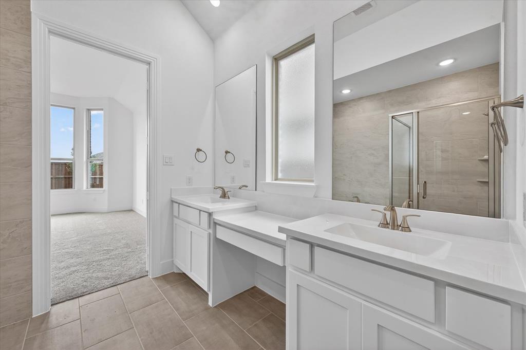 1629 Buscot Lane Fort Worth, TX 76052 - Photo 17 of 26 a bathroom with a sink double vanity and a mirror