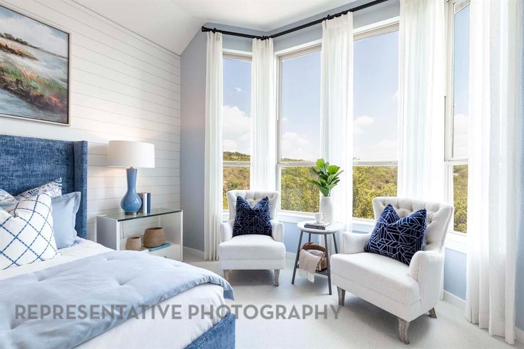 1629 Buscot Lane Haslet, TX 76052 - Photo 19 of 40 a bedroom with a large bed and a couch