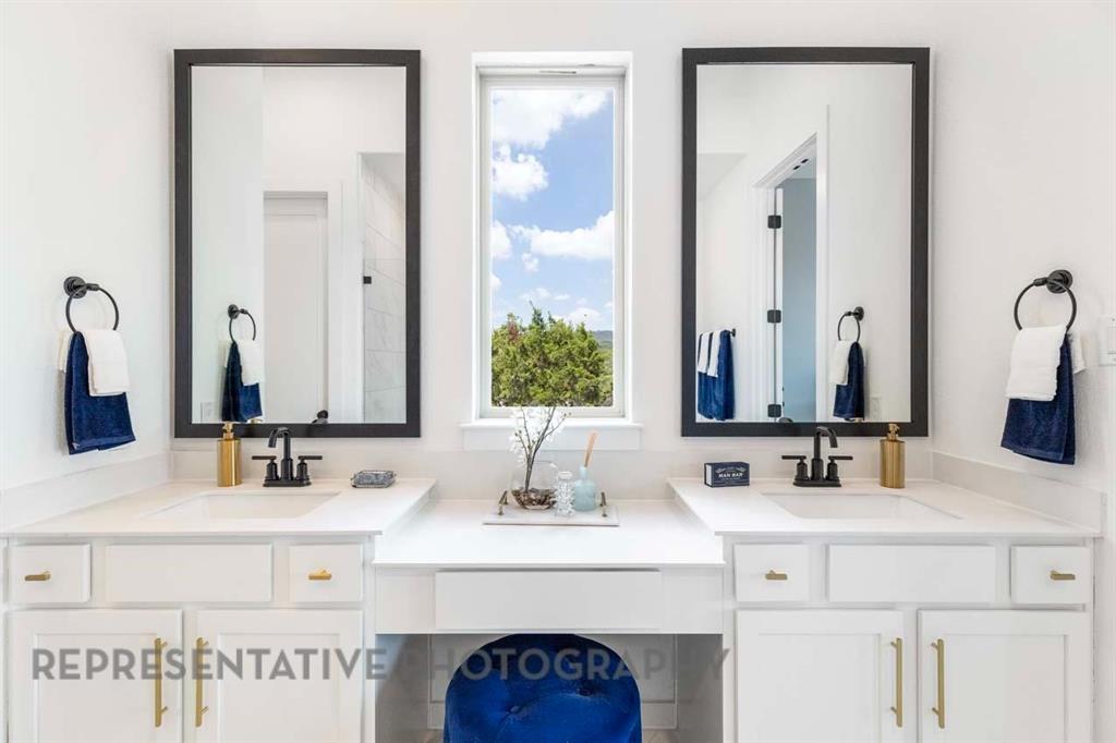 1629 Buscot Lane Haslet, TX 76052 - Photo 23 of 40 a bathroom with a sink vanity and a mirror