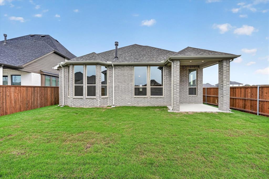 1629 Buscot Lane Fort Worth, TX 76052 - Photo 25 of 26 a house view with a garden space