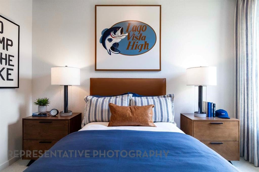 1629 Buscot Lane Haslet, TX 76052 - Photo 36 of 40 a bedroom with a bed and a lamp