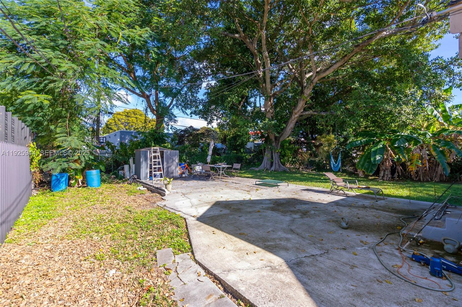 2271 Southwest 11th Street Miami, FL 33135 - Photo 12 of 17 a view of a backyard with swimming pool