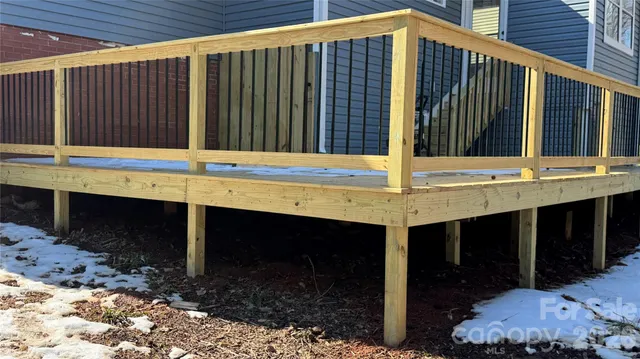 a view of a balcony with furniture