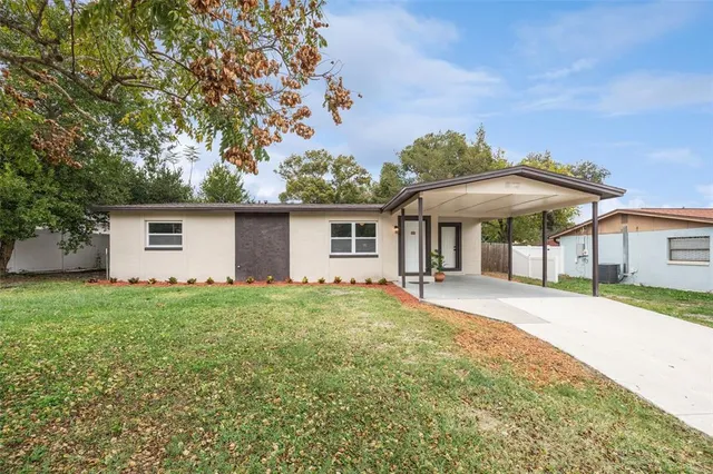 front view of a house with a yard
