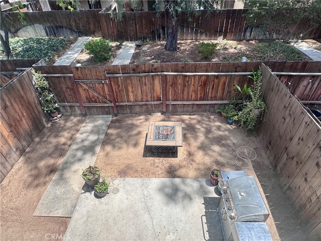 4877 Jackson Street, Unit B Riverside, CA 92503 - Photo 21 of 33 View of the Front Patio from the Primary Bedroom