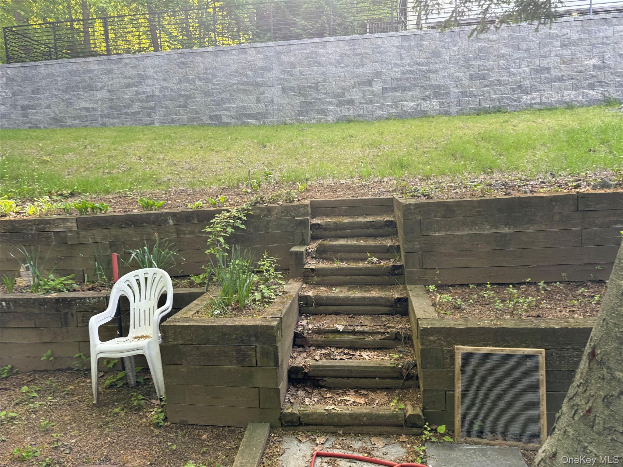 45 Upper Ritie Street Piermont, NY 10968 - Photo 17 of 30 a view of a outdoor space with seating area and swimming pool