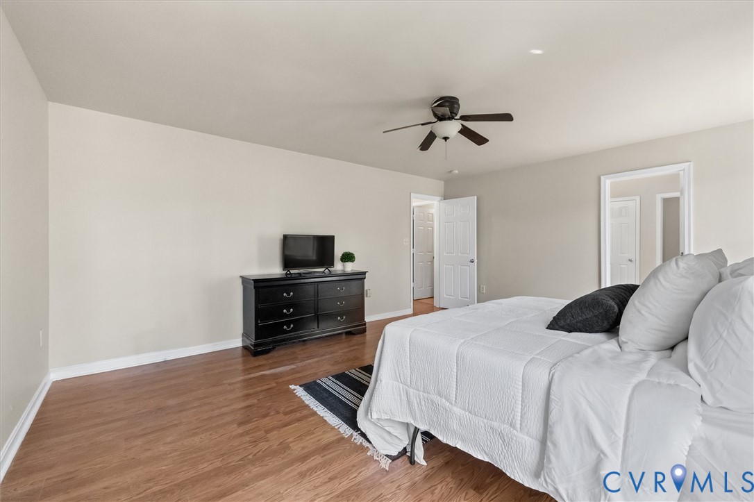 201 Washington Drive Ruther Glen, VA 22546 - Photo 16 of 27 a bedroom with a bed and a tv