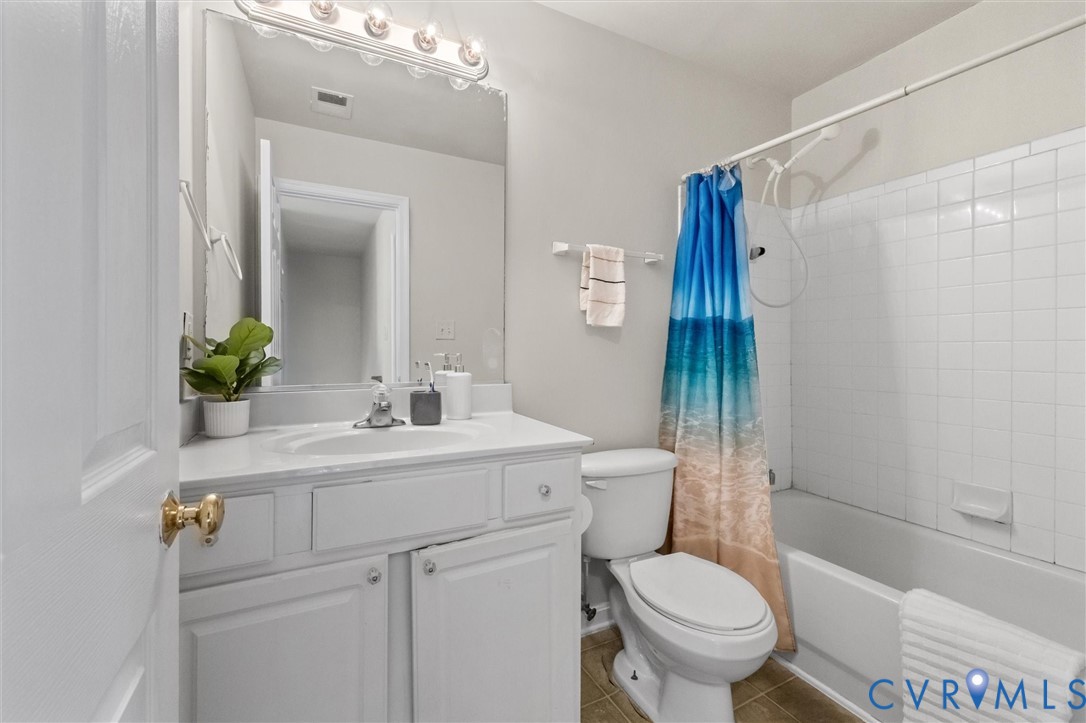 201 Washington Drive Ruther Glen, VA 22546 - Photo 22 of 27 a bathroom with a sink toilet and shower