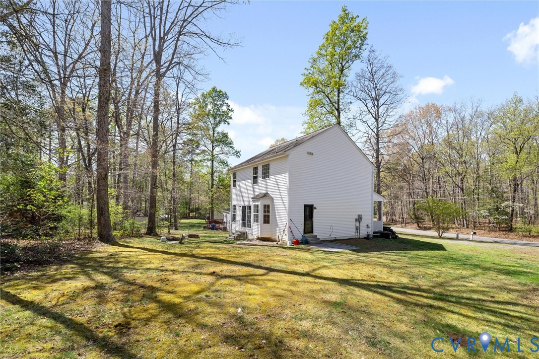 201 Washington Drive Ruther Glen, VA 22546 - Photo 25 of 27 a house view with yard in front of it