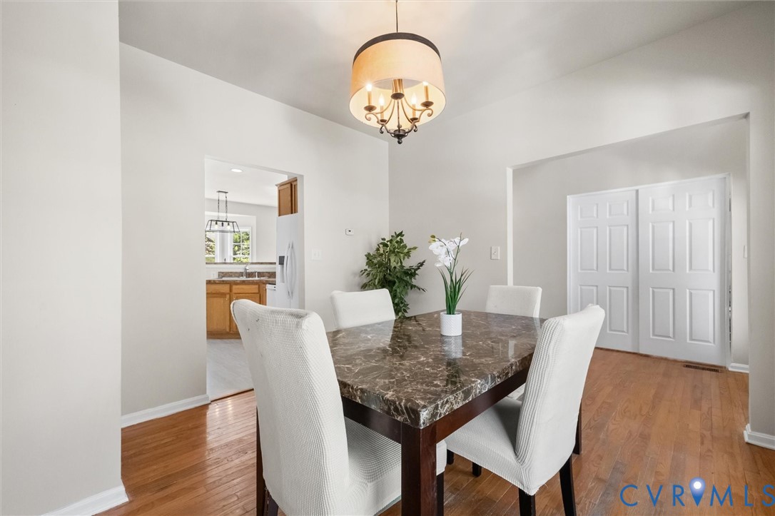201 Washington Drive Ruther Glen, VA 22546 - Photo 5 of 27 a view of a dining room with furniture and wooden floor