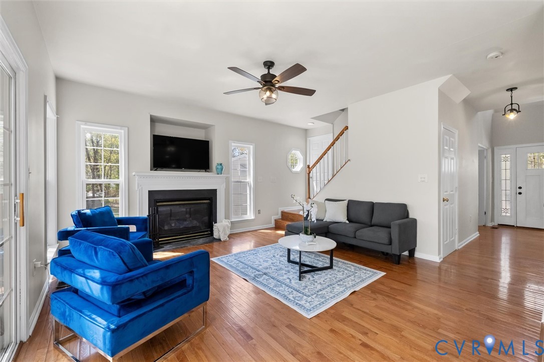 201 Washington Drive Ruther Glen, VA 22546 - Photo 7 of 27 a living room with furniture fireplace and a flat screen tv