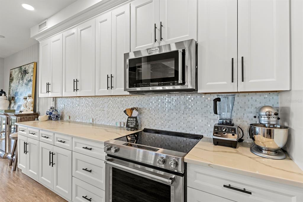 17 Seawatch Drive Boca Grande, FL 33921 - Photo 17 of 47 a kitchen with appliances a sink and cabinets