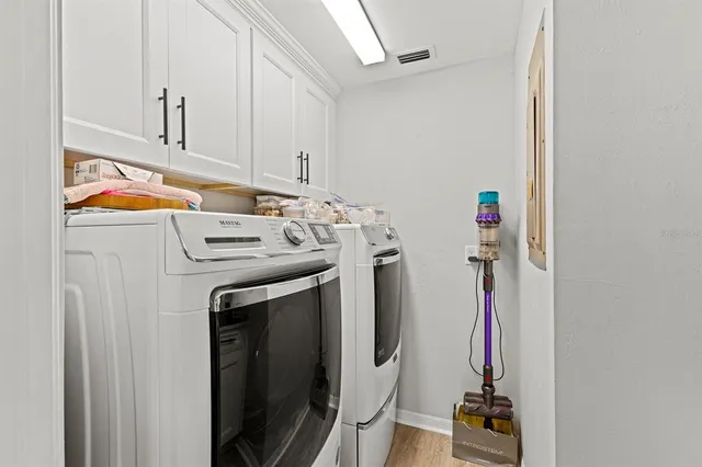 a bedroom with a bed and a table