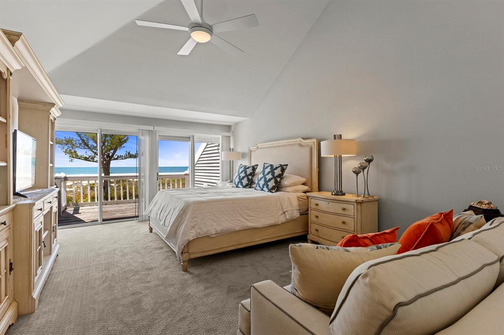 17 Seawatch Drive Boca Grande, FL 33921 - Photo 26 of 47 a bed room with two bed and a large window