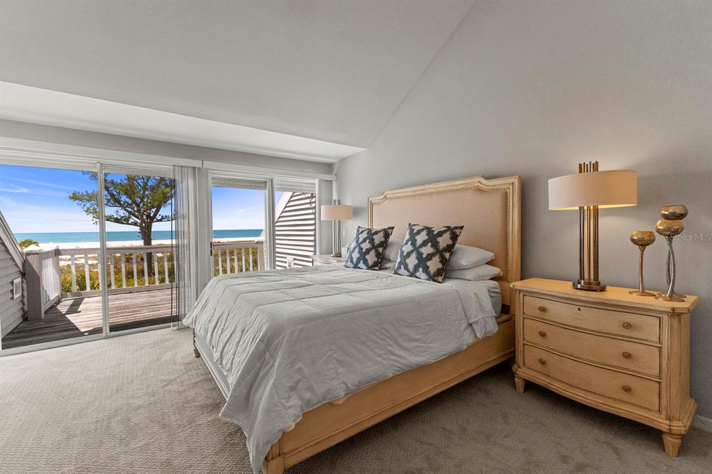 17 Seawatch Drive Boca Grande, FL 33921 - Photo 27 of 47 a bedroom with a bed and a table