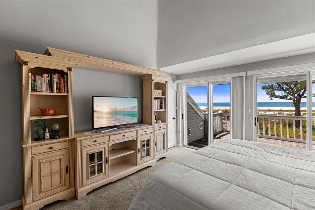 17 Seawatch Drive Boca Grande, FL 33921 - Photo 28 of 47 a bedroom with furniture and a flat screen tv