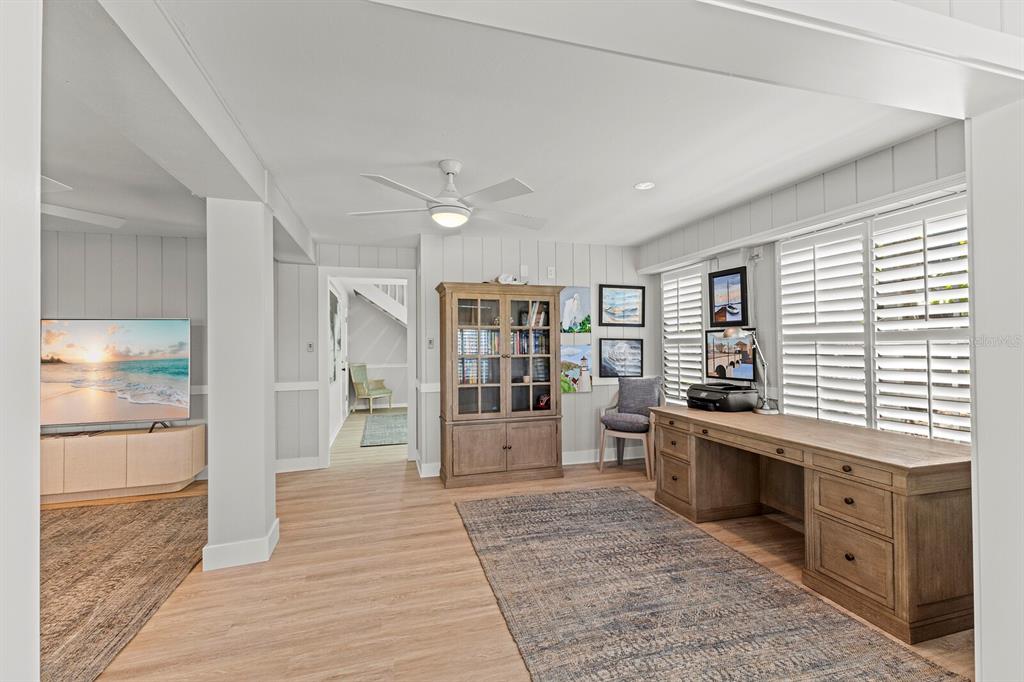 17 Seawatch Drive Boca Grande, FL 33921 - Photo 6 of 47 a room with lots of wooden furniture and windows