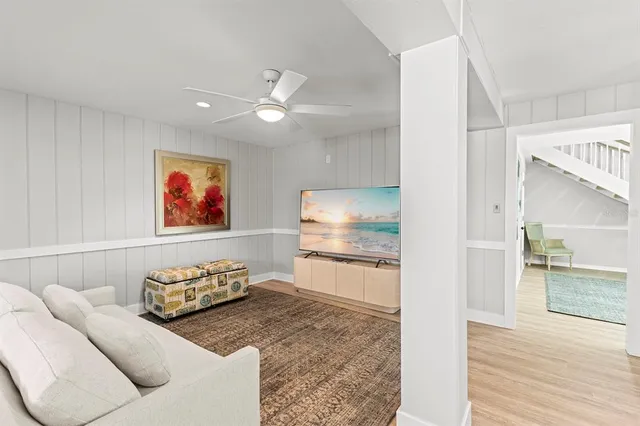 a living room with furniture or couch and a fireplace