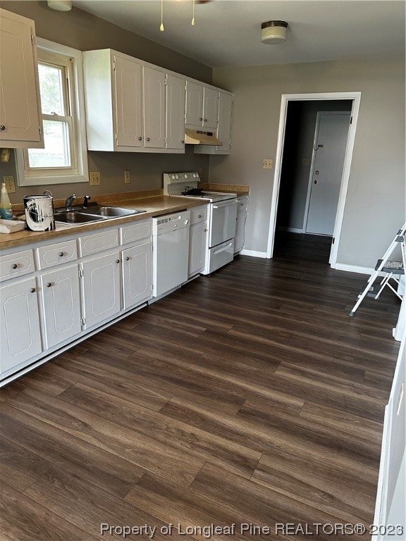 208 Duncan Road Spring Lake, NC 28390 - Photo 10 of 17 a kitchen with stainless steel appliances granite countertop a sink a stove and cabinets