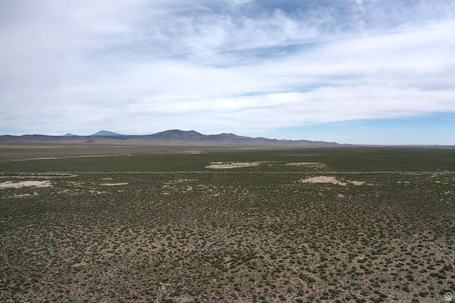 4000 Thermal Road Milford, UT 84751 - Photo 2 of 4 Expansive desert landscape with distant mountain ranges under a vast sky