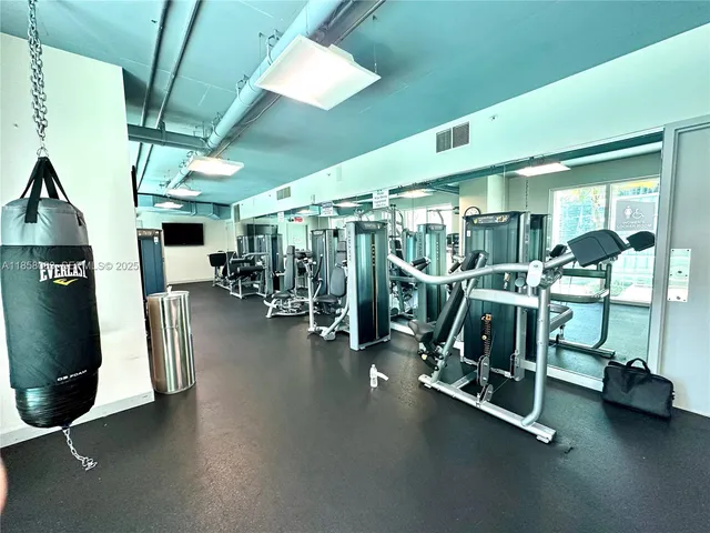 a view of a room with gym equipment