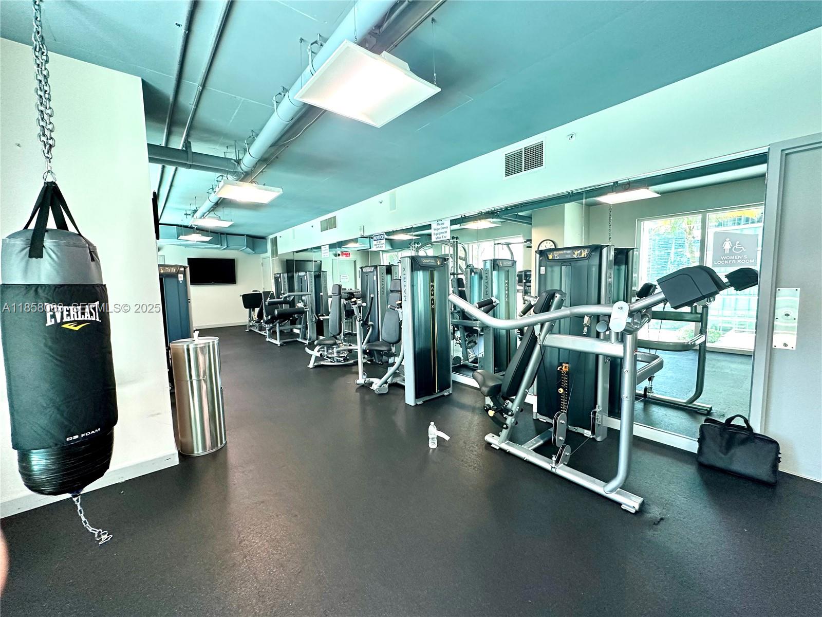 60 Southwest 13th Street, Unit 3207 Miami, FL 33130 - Photo 26 of 30 a view of a room with gym equipment