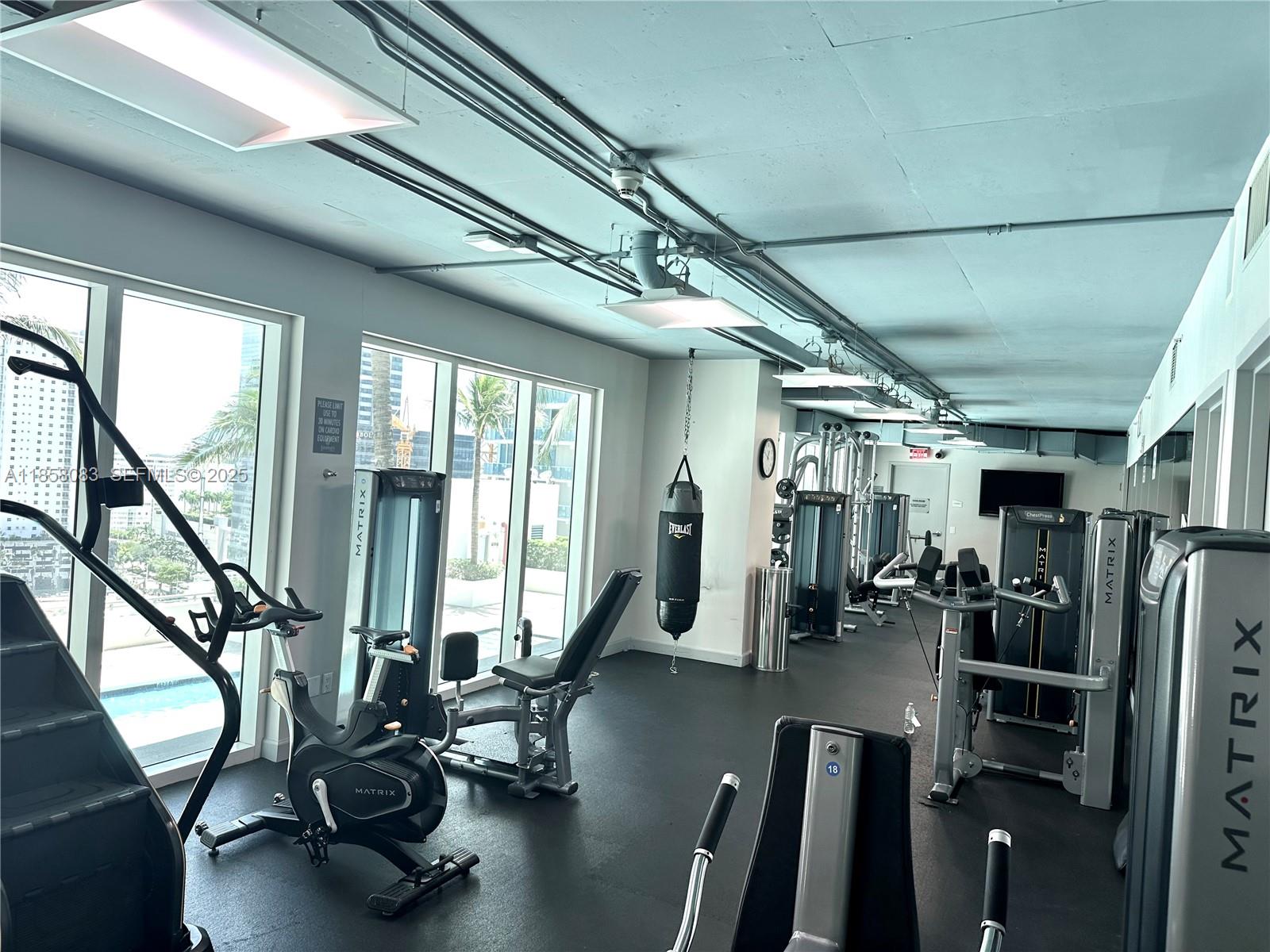 60 Southwest 13th Street, Unit 3207 Miami, FL 33130 - Photo 27 of 30 a view of a room with gym equipment