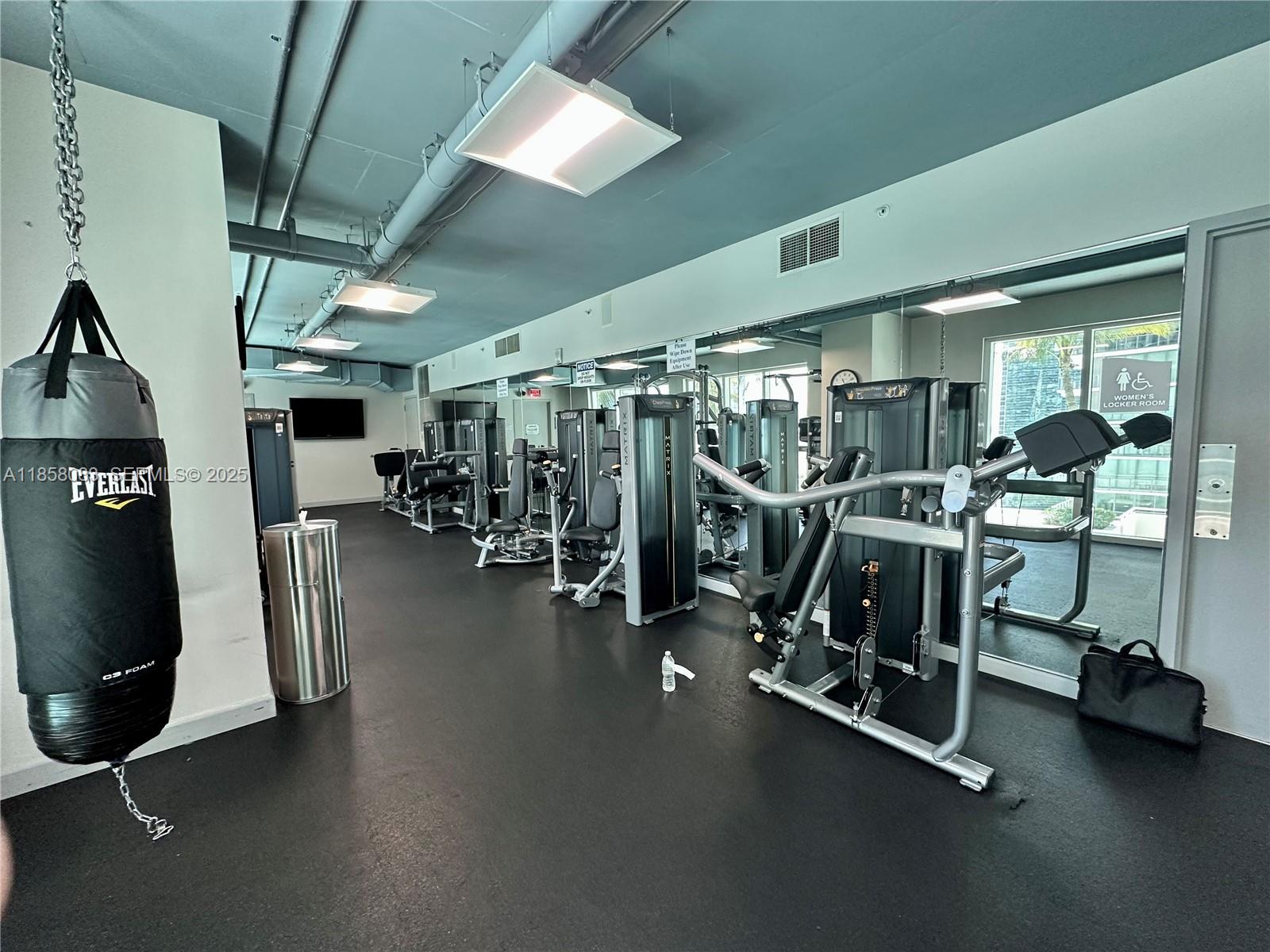 60 Southwest 13th Street, Unit 3207 Miami, FL 33130 - Photo 28 of 30 a view of a room with gym equipment
