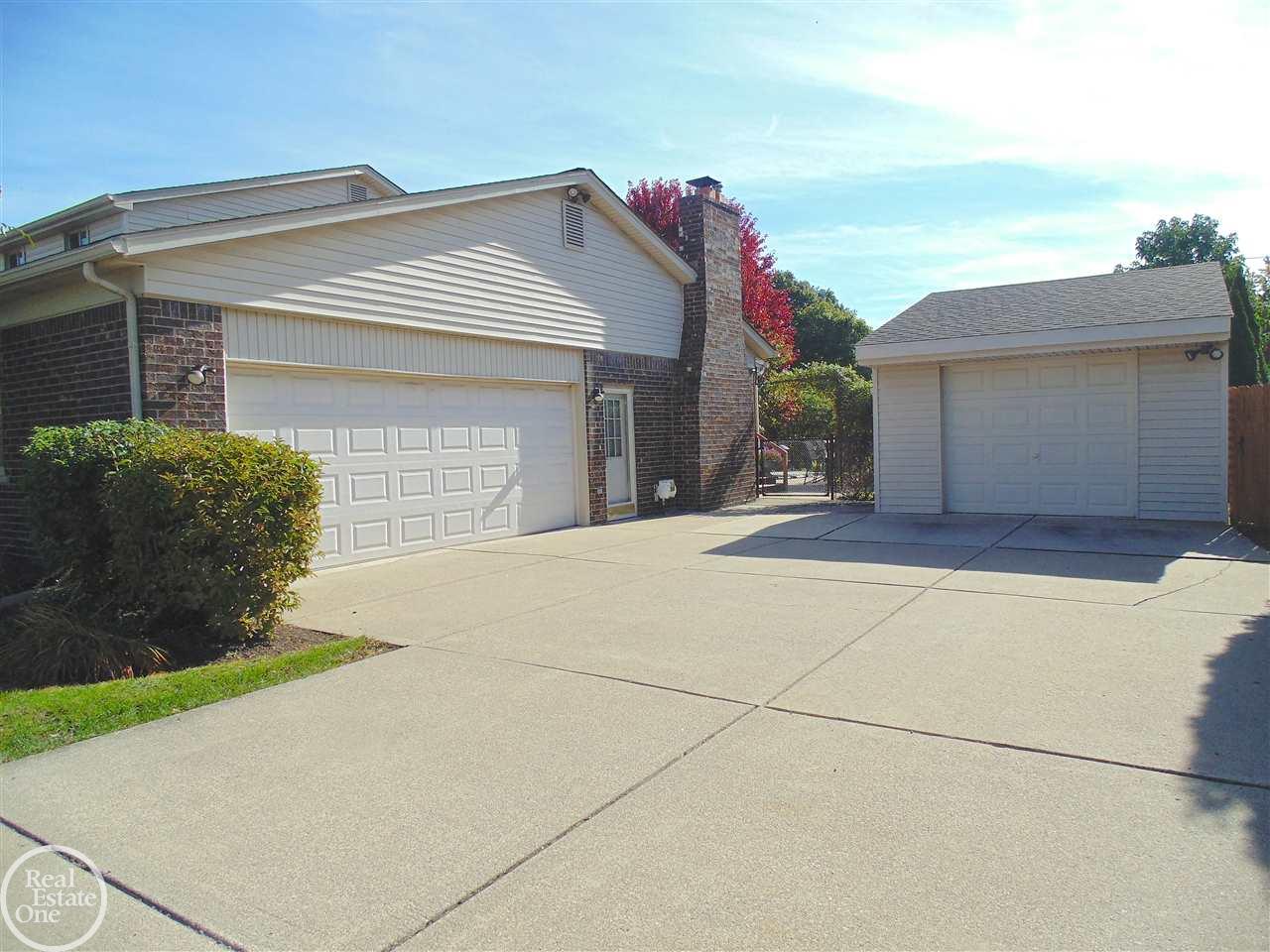 2290 Chicago Warren, MI 48092 - Photo 2 of 39 2.5 Garage with a huge shed that is 24 x 14