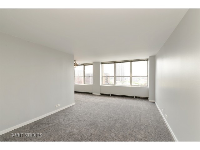 655 West Irving Park Road, Unit 1515 Chicago, IL 60613 - Photo 2 of 10 a view of an empty room with a window