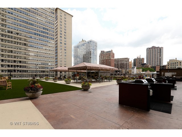 655 West Irving Park Road, Unit 1515 Chicago, IL 60613 - Photo 9 of 10 a view of a city with tall buildings