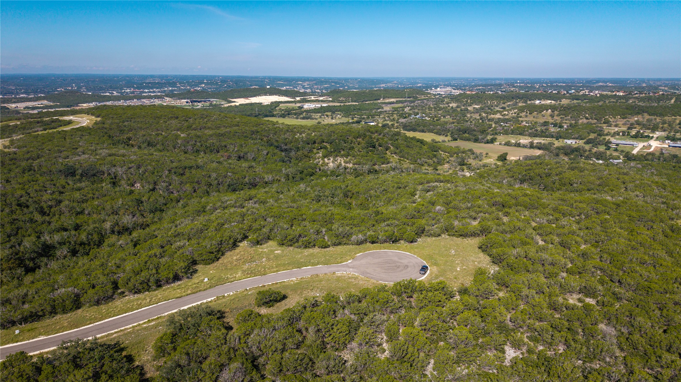 150 Henderson Branch Road West Ingram, TX 78025 - Photo 22 of 27 Aerial view of property's location featuring a forest