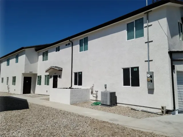 a front view of a house with windows