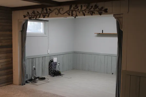 a view of a room with walk in closet and stairs