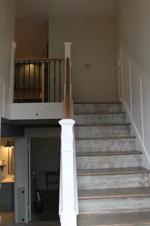 a view of entryway with wooden floor